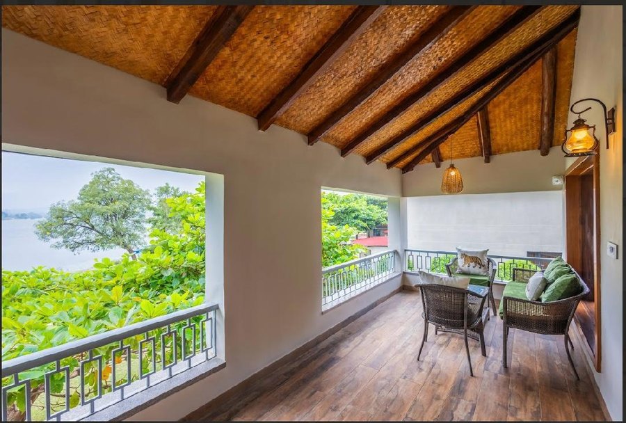 Upper-floor balcony at The Forest Chapter by Sayaji, Madhai
